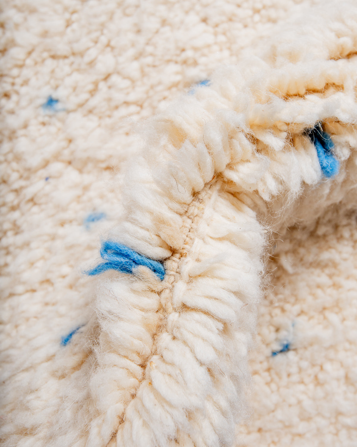 Modern, designer, handcrafted Berber rug from Morocco. Beniourain carpet with beautiful colours and patterns and fluffy wool texture.